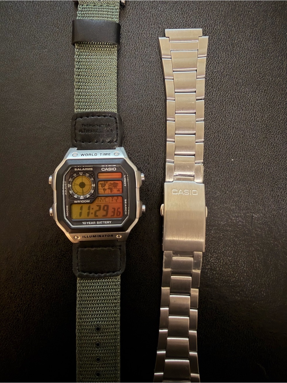 Casio Digital World Time Watch with Green Nylon Strap and Silver Bracelet